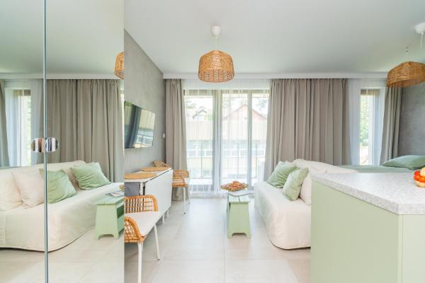 Nella foto è visibile l'oggetto APARTAMENTY MIERZEJA - STEGNA PARK STUDIO, 500 m od plaży, bezpłatny meleks situato nella città di Stegna.