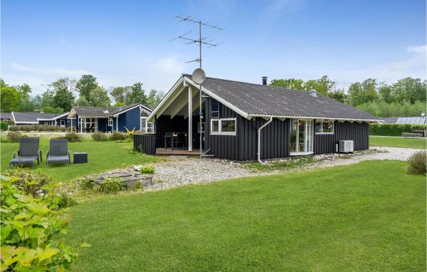 La photo montre l'objet Holiday Home Pøt Strandby Juelsminde Ii Dnkm situé dans la ville de Endelave By.