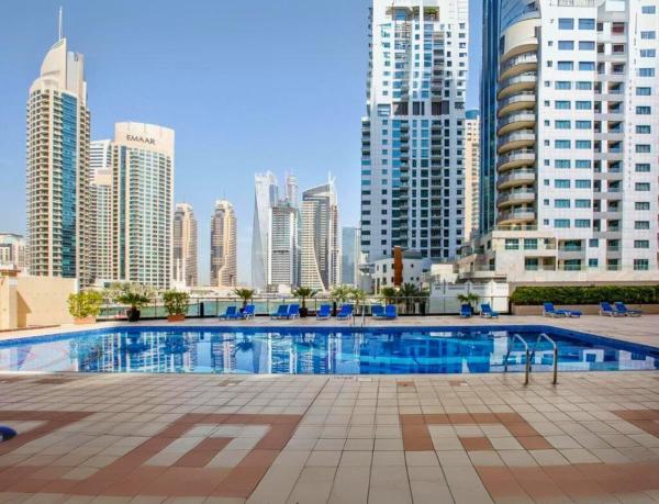 På billedet ses objektet Very Convenient Apartment steps to Metro and Marina Mall Managed by SunnyHomes beliggende i byen Dubai.