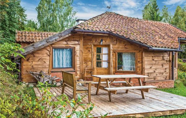 Na zdjęciu widoczny jest obiekt Three-Bedroom Holiday Home In Milakowo położony w mieście Warkały.
