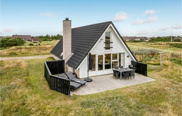 A la foto es mostra l'objecte Holiday Home Hvide Sande With A Fireplace 05 situat a la ciutat de Bjerregård.