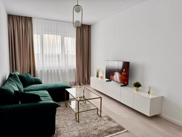A la foto es mostra l'objecte Cozy Apartment situat a la ciutat de Bucarest.