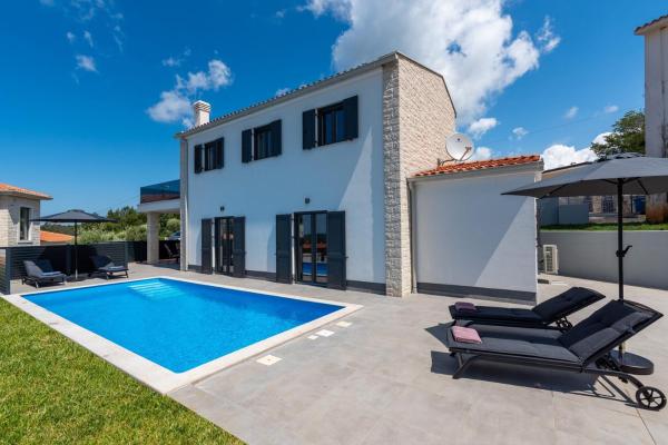 Nella foto è visibile l'oggetto Villa Molinari situato nella città di Fuškulin.
