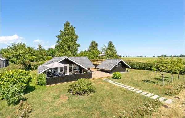 Na fotografii je vidět objekt Holiday Home Birkely Nysted Iv nacházející se ve městě Nysted.