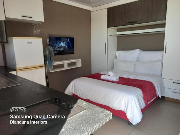 A la foto es mostra l'objecte Dlanduna GUEST House situat a la ciutat de Umzinto.
