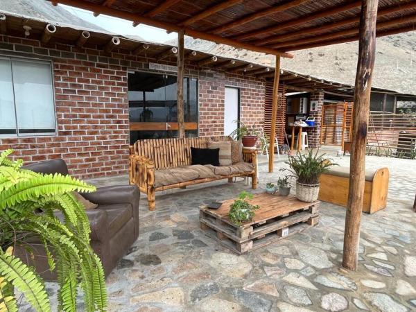A la foto es mostra l'objecte Cabaña de Campo Huaral, hermosas vistas Piscina situat a la ciutat de Aucallama.