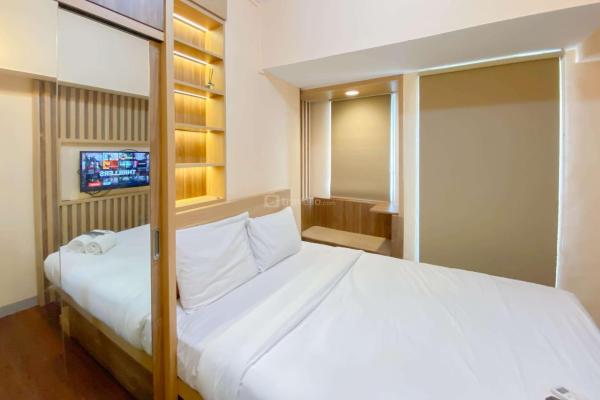 A la foto es mostra l'objecte Good and Simply Studio Tokyo Riverside PIK 2 Apartment By Travelio situat a la ciutat de Gedong.