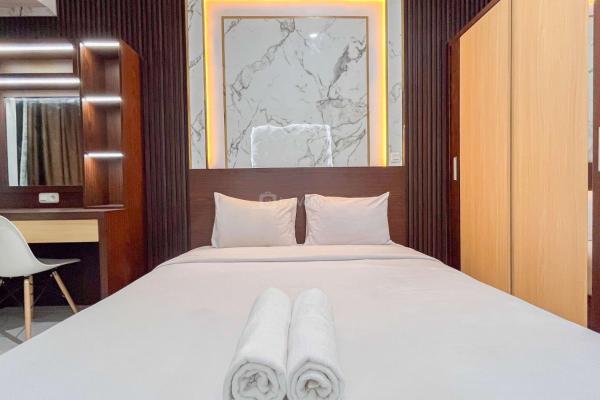 La photo montre l'objet Cozy Studio Apartment Delft Ciputra Makassar By Travelio situé dans la ville de Sungguminasa.