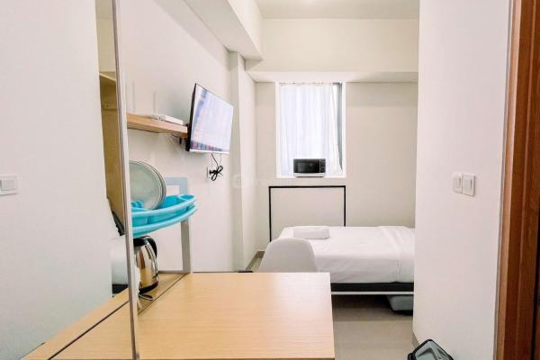 A la foto es mostra l'objecte Restful Studio (No Kitchen) Bandaraya - Tallasa City Makassar Apartment By Travelio situat a la ciutat de Tarallawe.