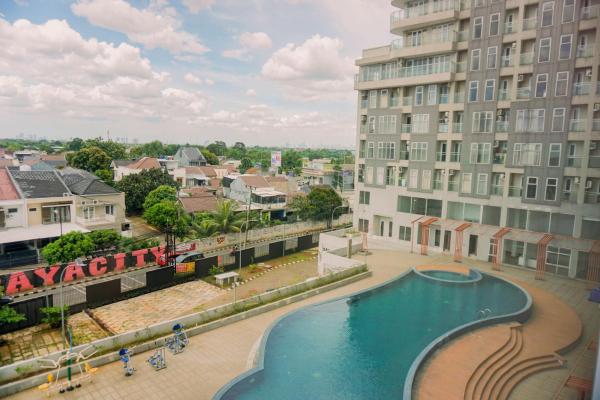 Op de foto is het object Modern Look and Homey Studio Apartment Amazana Serpong By Travelio te zien, gelegen in de stad Cileduk 1.