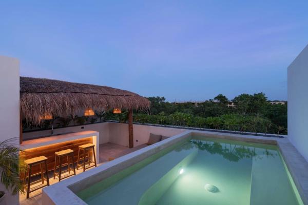 Na zdjęciu widoczny jest obiekt Itza Maya Beach Club Access położony w mieście Tulum.