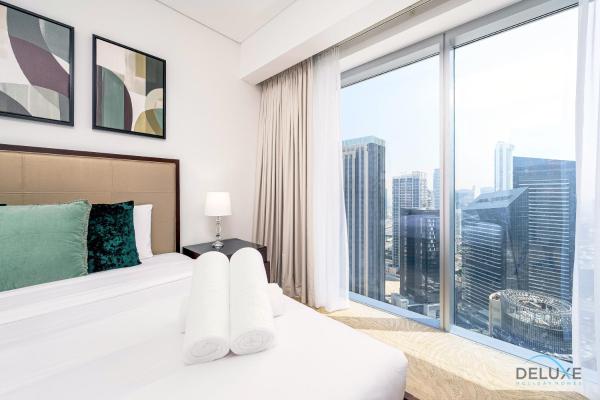 Na fotografii je vidět objekt Charming 1BR in The Address Residences Dubai Marina by Deluxe Holiday Homes nacházející se ve městě Dubaj.