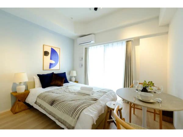 The photo shows the ZOOM Esaka Park - Vacation STAY 17110 located in the city of Suita.