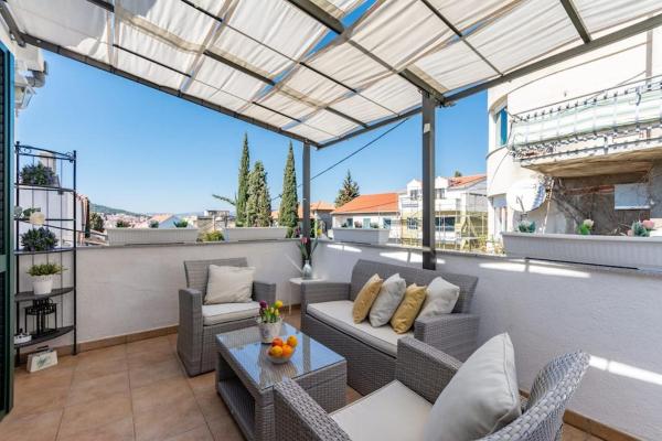 The photo shows the Sun house in the centre located in the city of Split.