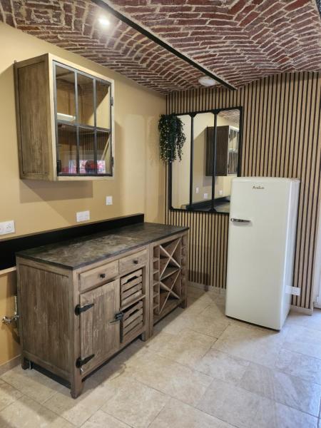 Na fotografii je vidět objekt AU TEMPS JADIS - Gîte Atypique dans une ancienne Etable Cour privée nacházející se ve městě Chocques.