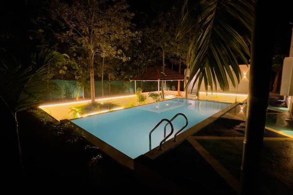 A la foto es mostra l'objecte Serenity Farm Stay situat a la ciutat de Hullahalli.