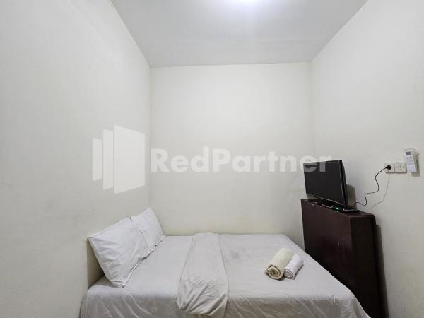 A la foto es mostra l'objecte Gedangan Indah Homestay RedPartner situat a la ciutat de Buduran.