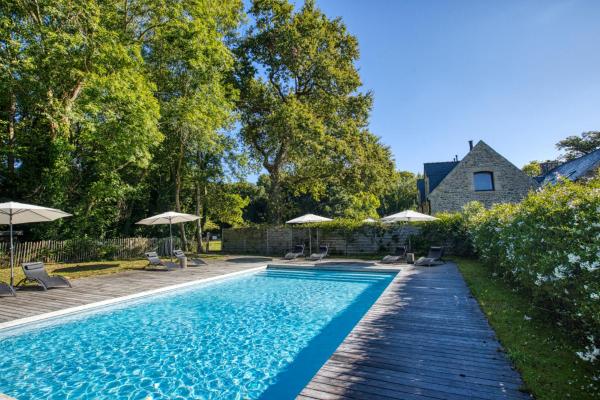 A la foto es mostra l'objecte Les gîtes du Plec - Piscine situat a la ciutat de Locoal-Mendon.