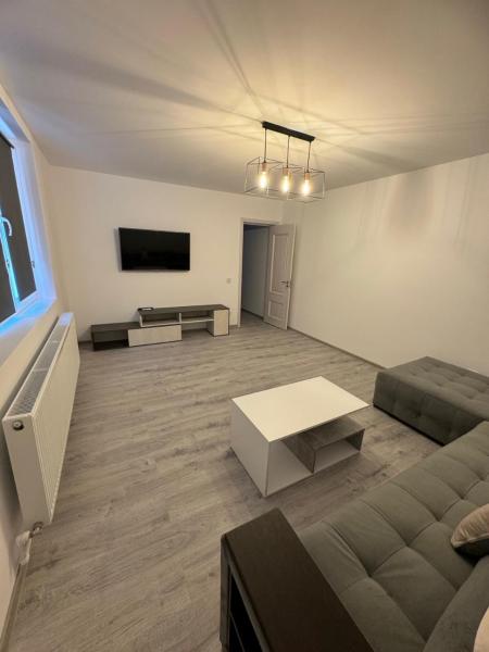 A la foto es mostra l'objecte Apartament modern, totul nou, in centrul orasului situat a la ciutat de Putineiu.