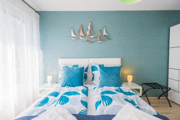 A la foto es mostra l'objecte Blue Apartman Szántód situat a la ciutat de Szántód.