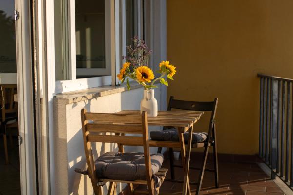 Auf dem Foto ist das Objekt GuestHost - Lucca Roomy Apartment with Balcony and Parking! in der Stadt Lucca zu sehen.