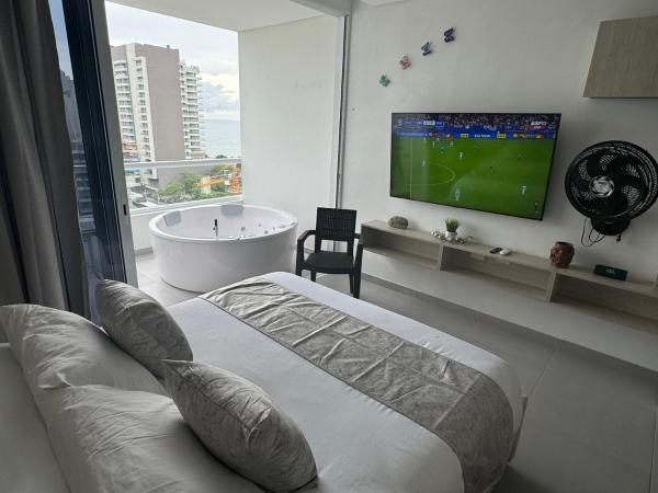 Bilde 2: Suite con Jacuzzi, vista al mar y piscinas piso 13