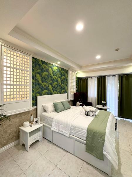 One Bedroom with Balcony by Christine Suites PH in Greenbelt Radisson, Manila
