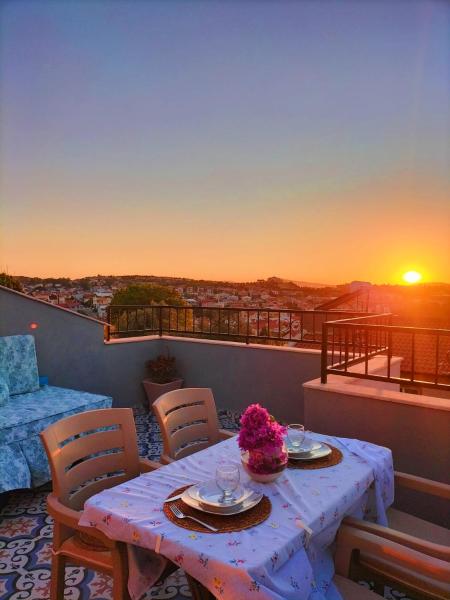 The photo shows the The Rooftop Urla located in the city of Urla.