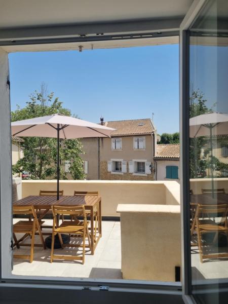 Na zdjęciu widoczny jest obiekt Maison de village avec terrasse położony w mieście Grans.