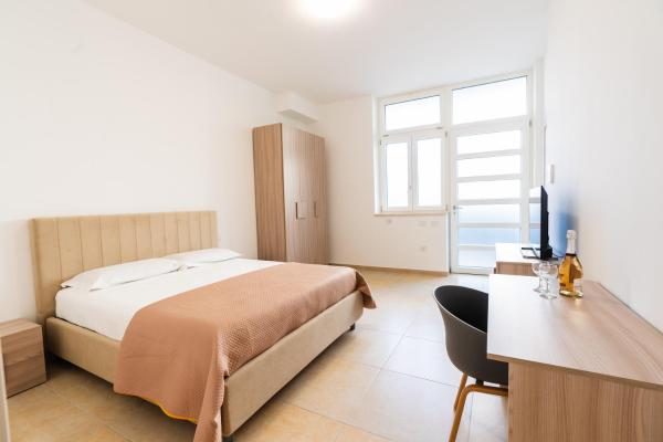 A la foto es mostra l'objecte GuestHost - Porta 29 Rooms situat a la ciutat de Trani.