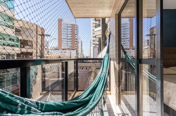 A la foto es mostra l'objecte Apt na quadra da praia do Morro com área Lateral situat a la ciutat de Guarapari.