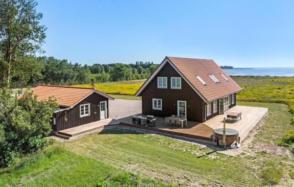 La photo montre l'objet 4 Bedroom Amazing Home In Askø situé dans la ville de Askø By.