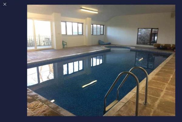 A la foto es mostra l'objecte Orchard Cottage with a Private Pool and EV point situat a la ciutat de Blagberry.