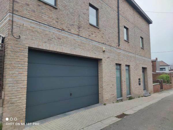 The photo shows the 8 chambres privées dans une villa de luxe partagée de 350m2 located in the city of Montignies-sur-Sambre.