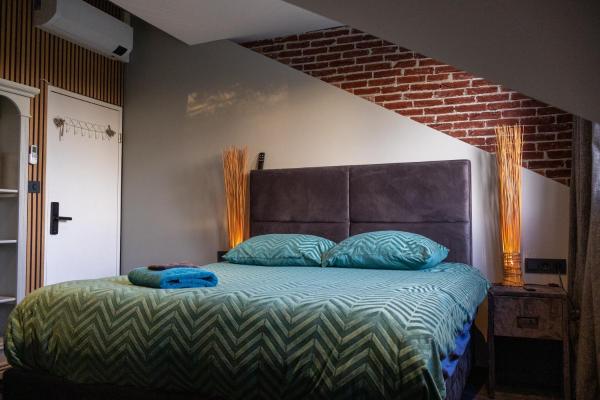 A la foto es mostra l'objecte Koraal - Comfortabele kamer bij B&B Gezond aan Zee - Toegang Wellnesstuin meerprijs situat a la ciutat de Ouddorp.