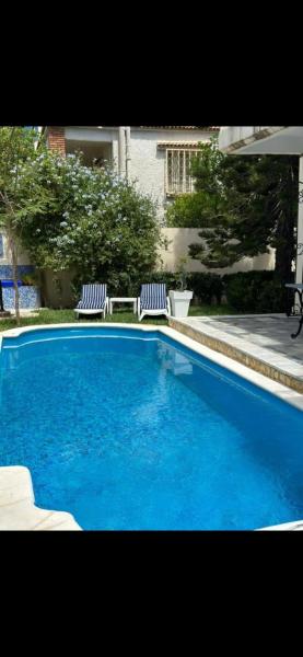 A la foto es mostra l'objecte Magnifique duplex avec piscine situat a la ciutat de Ouled Fayet.