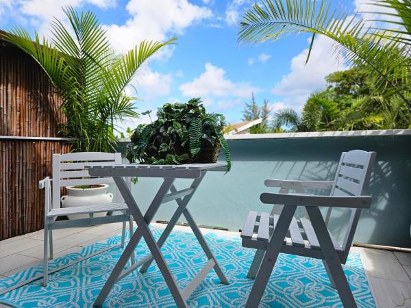 Na foto é possível ver o objeto An Artistic Retreat localizado na cidade de Delray Beach.