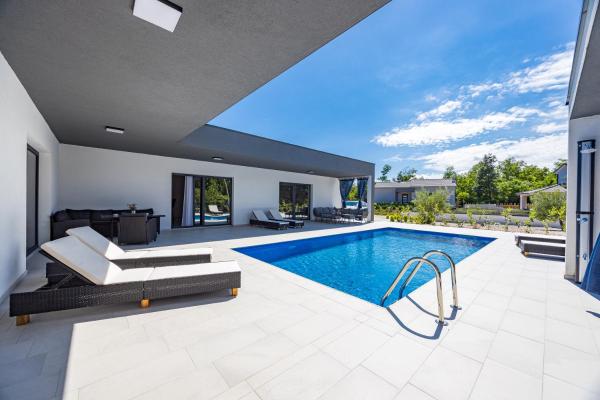 A la foto es mostra l'objecte Pool House Fancy - Happy Rentals situat a la ciutat de Labin.