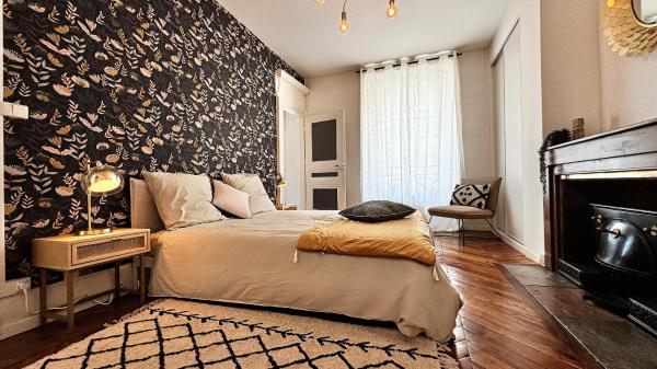 A la foto es mostra l'objecte Suite Flamenco Check in h24 - Wifi situat a la ciutat de Oullins.