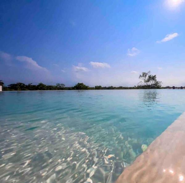 照片显示了位于Balcheil市的Lush Tulum Jungle Penthouse with Ensuite Rooftop Pool & HighSpeed Wifi物件。