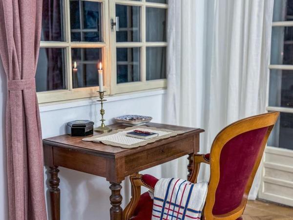 A la foto es mostra l'objecte Le Rustique situat a la ciutat de Brax.
