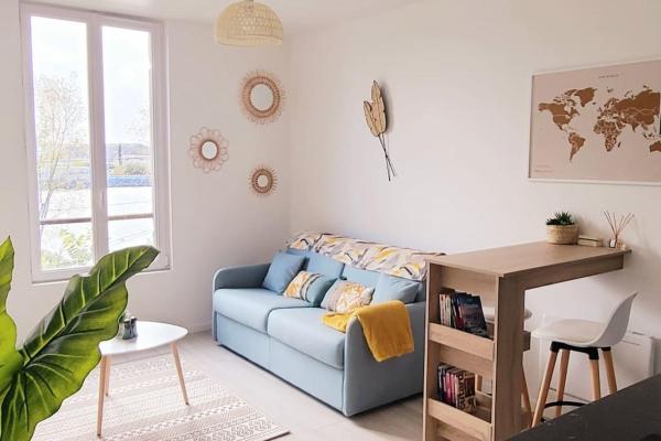 A la foto es mostra l'objecte studio cosy avec vue sur la Seine situat a la ciutat de Andrésy.