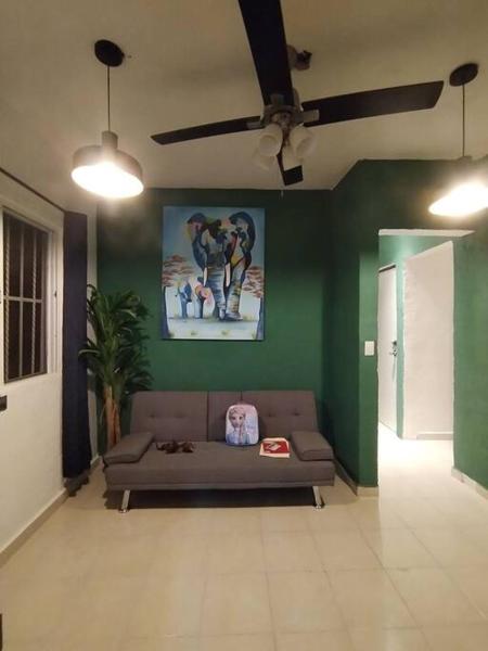 Na foto é possível ver o objeto Casa verde localizado na cidade de Calderas.