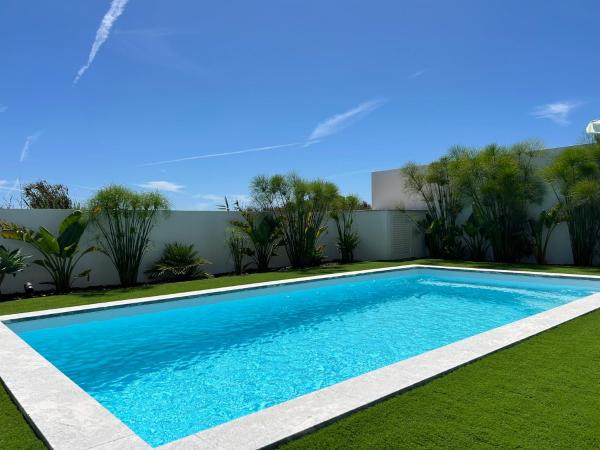 A la foto es mostra l'objecte Blue Villa Ericeira - Surf & Family situat a la ciutat de Galiza.