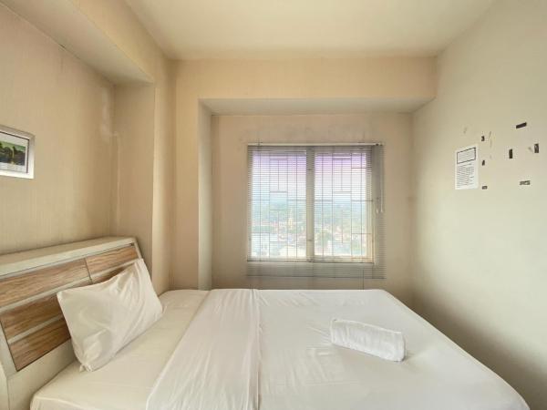 A la foto es mostra l'objecte Cozy 2BR at Pinewood Apartment By Travelio situat a la ciutat de Sumedang.