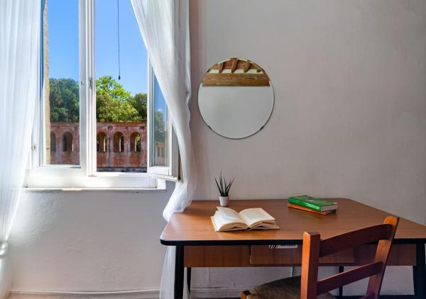 A la foto es mostra l'objecte Casa sulle Mura Antiche situat a la ciutat de Pisa.