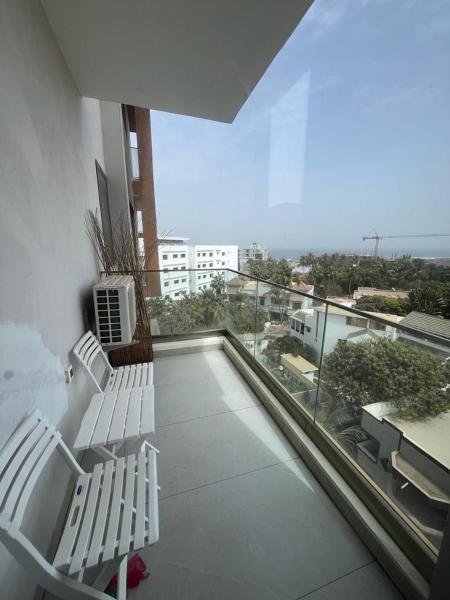 A la foto es mostra l'objecte Charmant Studio Cosy situat a la ciutat de Dakar.