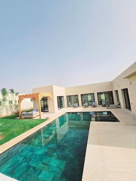 På billedet ses objektet Villa Hanaine, Piscine Cuisinière beliggende i byen Marrakech.
