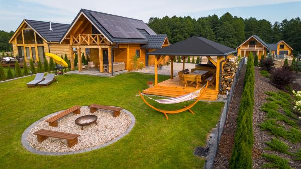 Auf dem Foto ist das Objekt Przystanek MAZURY - domki nad jeziorem in der Stadt Giże zu sehen.