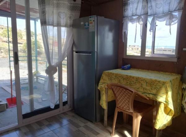 A la foto es mostra l'objecte Petite maison de tôle Rodriguaises situat a la ciutat de Tambe.